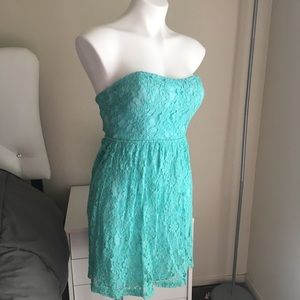 Aqua lace strapless dress.